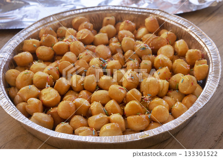 traditional italian pignolata honey pastry balls with colorful sprinkles 133301522