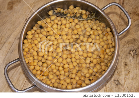 cooked chickpeas with rosemary in stainless steel pressure cooker pot cooked chickpeas with rosemary in stainless steel pressure cooker pot 133301523