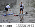 Sup surfing, two athletes 133301943