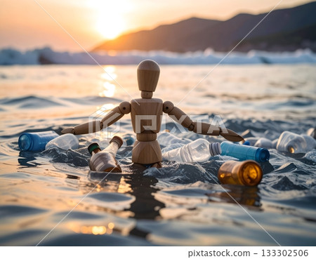 Plastic waste backlit by the blue sea and the setting sun Plastic waste backlit by the blue sea and the setting sun 133302506