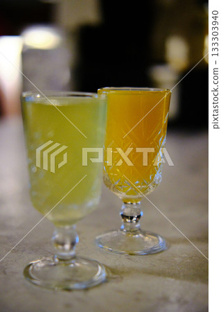 Two Shots of Herbal Liqueur on Table Two Shots of Herbal Liqueur on Table 133303940