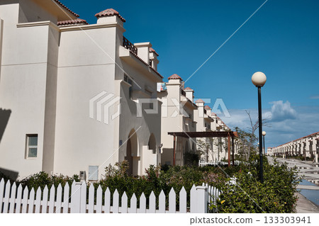 Row of Modern White Houses with Blue Sky 133303941
