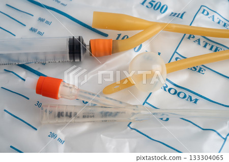 Foley catheter and urine drainage bag collect urine for disability or patient in hospital. Foley catheter and urine drainage bag collect urine for disability or patient in hospital. 133304065