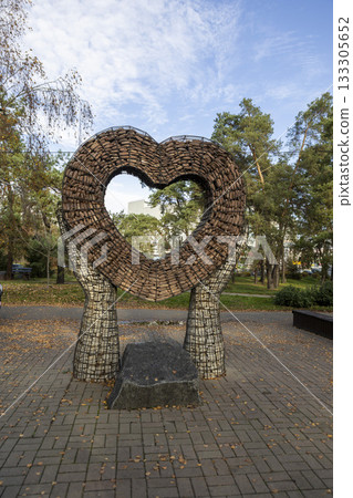 an urban sculpture in the form of hands holding a heart an urban sculpture in the form of hands holding a heart 133305652