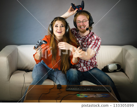 Gamer couple playing games Gamer couple playing games 133305899