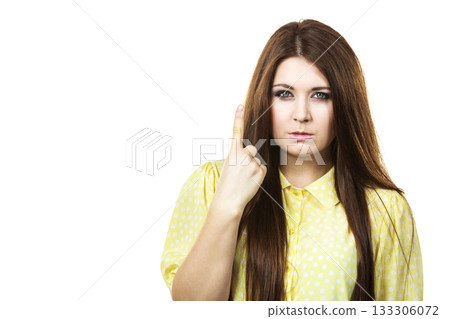 Serious woman being mad pointing 133306072