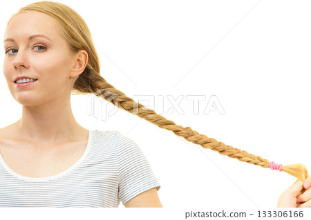 Blonde young woman with braid hair Blonde young woman with braid hair 133306166