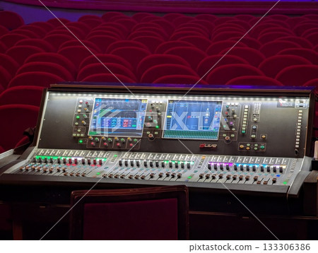 digital mixing console at a concert. digital mixing console at a concert. 133306386