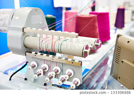 Industrial sewing machine in textile factory 133306886