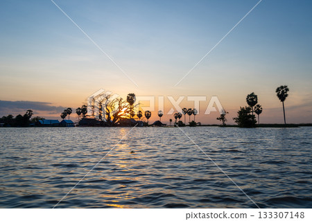 Sunset over floating Bugis fishermen village, Lake Tempe, Sulawesi, Indonesia Sunset over floating Bugis fishermen village, Lake Tempe, Sulawesi, Indonesia 133307148