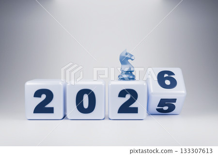 The wooden blocks display the year 2025-2026, with a small chess piece 133307613
