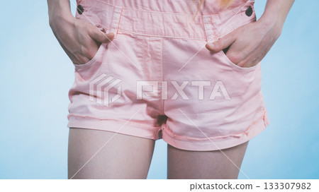 Woman legs wearing pink shorts Woman legs wearing pink shorts 133307982