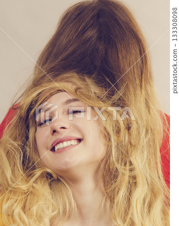 Two girls creating hairdo. Hair ombre color 133308098