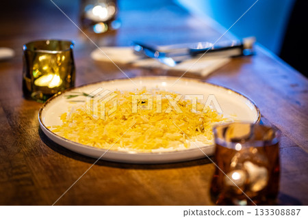 Arabic food- mutton and rice pilaf on the plate 133308887