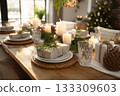 Wooden dining table decorated with candles, pine branches, and wrapped gifts 133309603