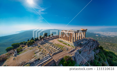 Overlooking the ruins of a Greek temple on the summit 133310618