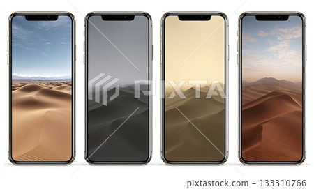 Four smartphones displaying desert sand dunes wallpapers Four smartphones displaying desert sand dunes wallpapers 133310766