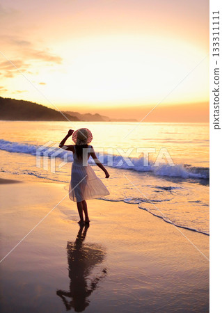 She walks along the shore 133311111