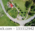 The roundabout road aerial view that newly developed. Summer sunny day. Roundabout on suburban road. 133312942