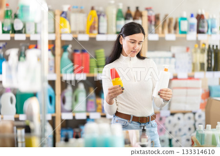 woman went to a hardware store in Spain for suntan products and SPF woman went to a hardware store in Spain for suntan products and SPF 133314610