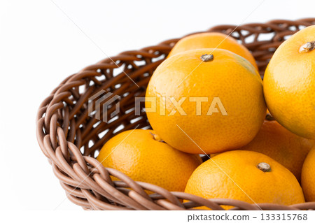 Close-up of mandarin oranges in a basket Close-up of mandarin oranges in a basket 133315768