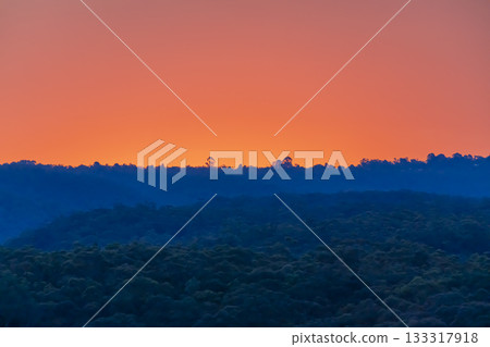 A vibrant orange Sunset in the Blue Mountains in Australia 133317918