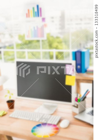 Computer monitor against window 133318499