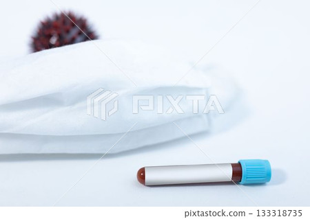 Blood sample test tube, face mask and Covid-19 cell 133318735