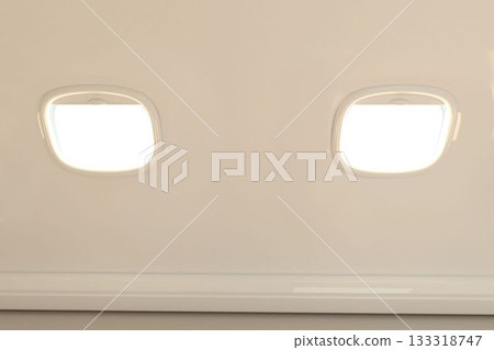 Sky seen through windows of airplane 133318747