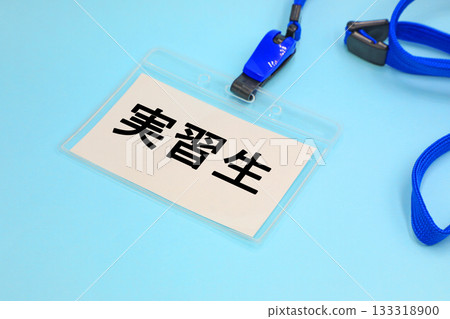 A name tag that says "trainee" A name tag that says "trainee" 133318900