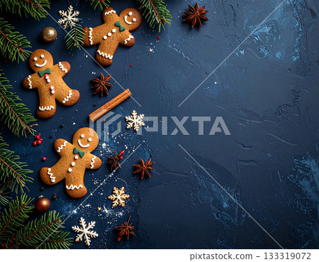 Elegant Christmas flat lay with gingerbread on a navy background Elegant Christmas flat lay with gingerbread on a navy background 133319072