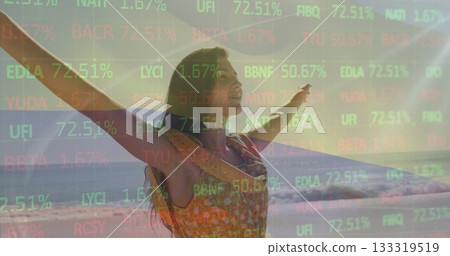 Standing woman wearing sleeveless dress, stretching arms at sandy shore, with stock market overlay Standing woman wearing sleeveless dress, stretching arms at sandy shore, with stock market overlay 133319519