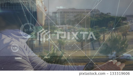 Gazing woman in top and smartwatch, viewing data overlay through window at city view, copy space Gazing woman in top and smartwatch, viewing data overlay through window at city view, copy space 133319606