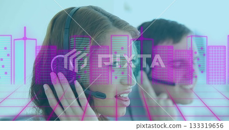 Adjusting headset and speaking support agent in business casual at office with digital city overlay 133319656