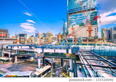 Tokyo cityscape, Japan, November 19th. Steel frames assembled on the deck stretch to the left edge... Crawler cranes, etc. = Shibuya 133320040