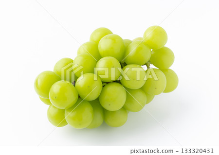 A bunch of Shine Muscat grapes on a white background A bunch of Shine Muscat grapes on a white background 133320431