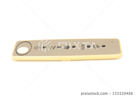 Air conditioner remote control on a white background Air conditioner remote control on a white background 133320488