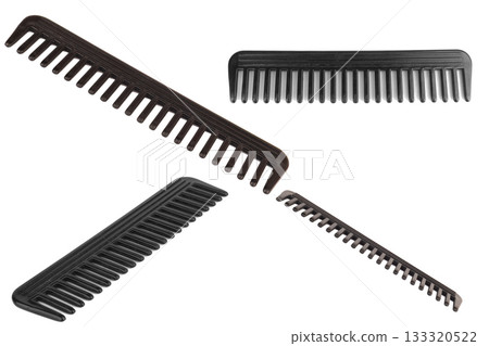 Black hair comb on white background Black hair comb on white background 133320522