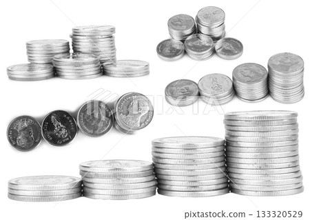 Silver coins on a white background Silver coins on a white background 133320529
