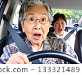 Danger! Elderly female driver and passenger 133321489