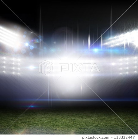 Bright floodlight beams are illuminating outdoor wet grass pitch in flat design, with lens flares 133322447
