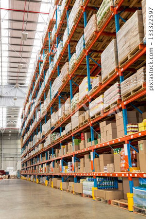 Cardboard boxes arranged on rack in factory Cardboard boxes arranged on rack in factory 133322597
