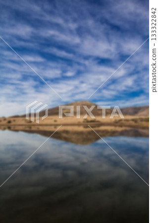 River in front of mountain 133322842