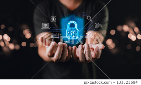 A person holds out their hands beneath a glowing digital padlock surrounded by icons, symbolizing cyber protection, data encryption, security layers, and privacy in a connected digital world. 133323684