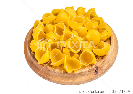 Jambo Pipe rigate raw pasta isolated on white background. top view Jambo Pipe rigate raw pasta isolated on white background. top view 133323709