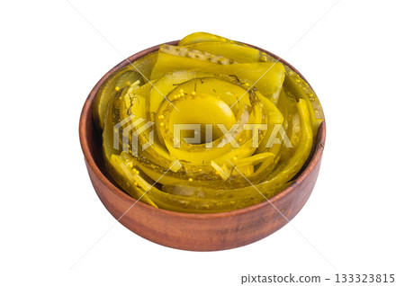 Spiral sliced pickles in a wooden bowl on white background, tangy brined cucumbers with dill and mustard seeds in top view. Spiral sliced pickles in a wooden bowl on white background, tangy brined cucumbers with dill and mustard seeds in top view. 133323815
