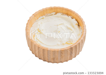 Cream texture, Mascarpone Italian cream cheese in wooden bowl isolated on white background. top view 133323894