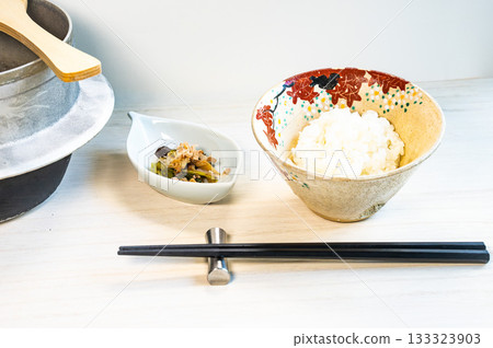 Freshly cooked rice and small side dishes 133323903