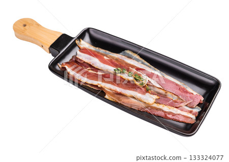 Cured dried duck breast meat slices isolated on white background. top view Cured dried duck breast meat slices isolated on white background. top view 133324077