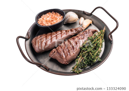 Grilled Mutton tenderloin fillet steak, lamb meat with herbs isolated on white background. top view Grilled Mutton tenderloin fillet steak, lamb meat with herbs isolated on white background. top view 133324090